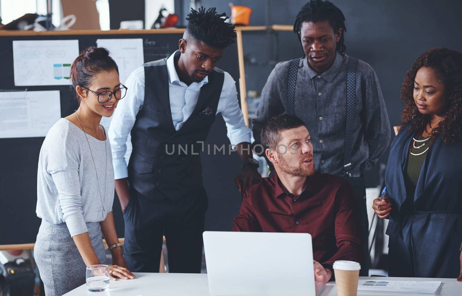 Could you repeat that. a group of creative businesspeople meeting in their office