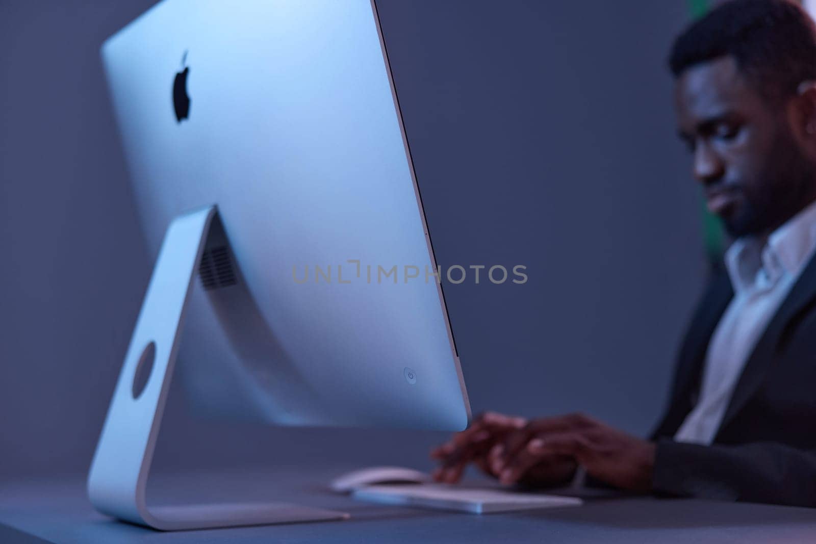 man freelancer technology work night online digital keyboard lifestyle american business african by SHOTPRIME