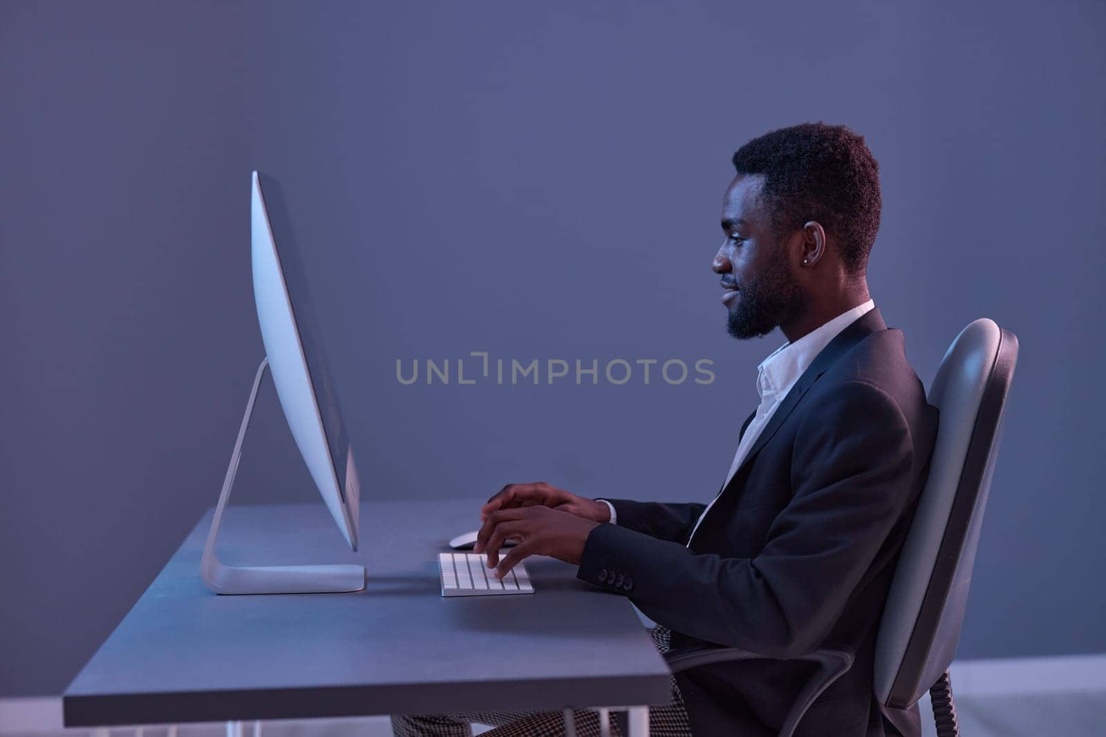 man african night work american business keyboard freelancer communication lifestyle technology online by SHOTPRIME