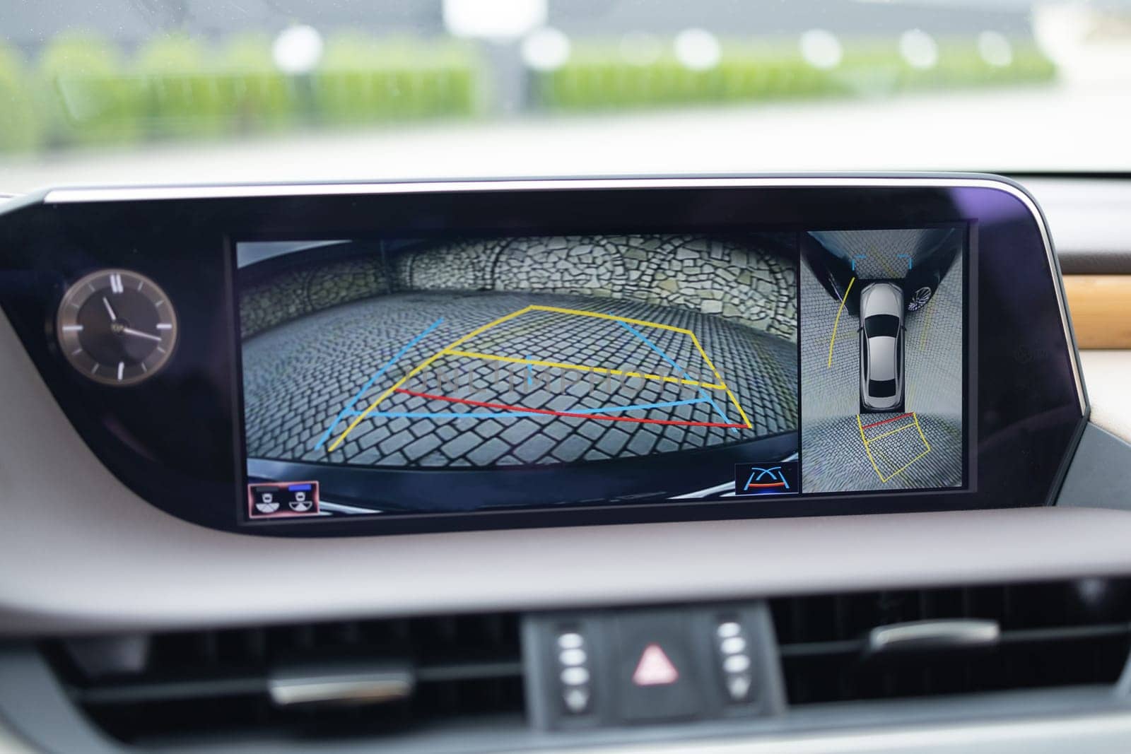 Surround view monitor. Front camera of circular 360 degrees view system. 360 terrain system in a modern car. Dashboard display screen with multimedia and 360 camera view in a new luxury vehicle.