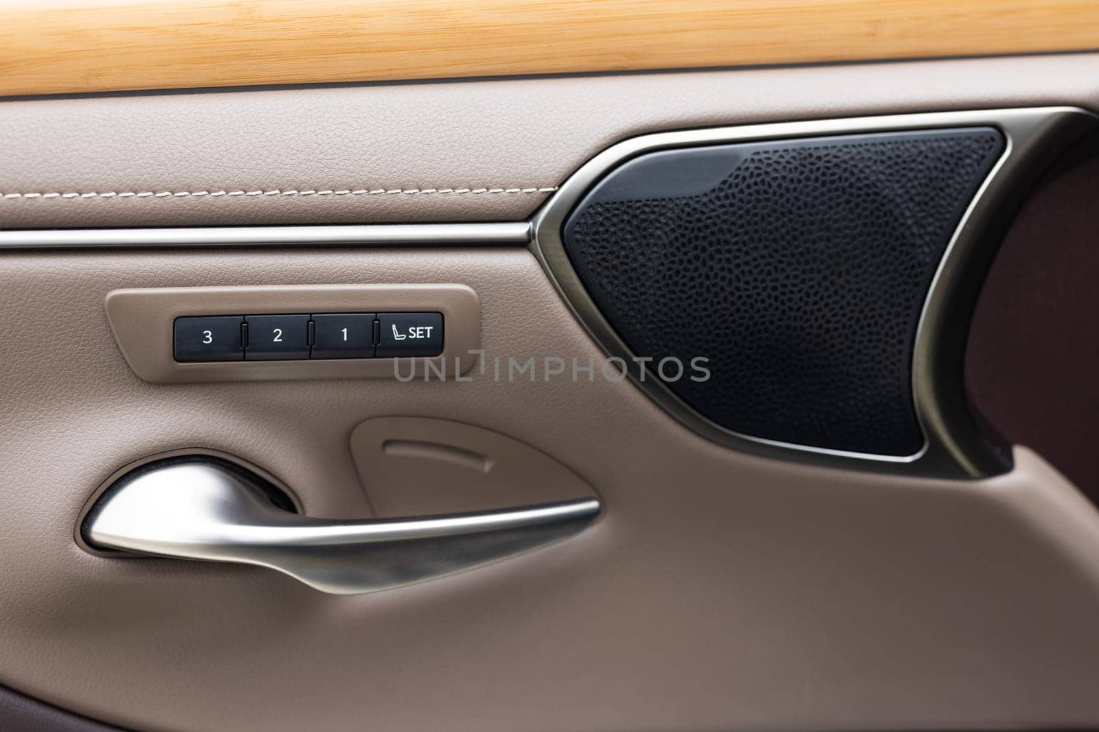 Buttons for adjusting seat position with memory. Car automatic seat memory control buttons close-up. Memory seat technology inside luxury vehicle car