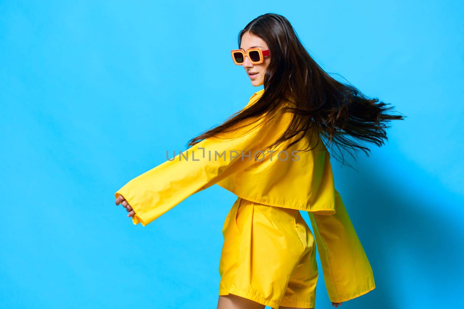 woman girl yellow isolated lady funny glamour sunglasses beautiful lovely lifestyle hairstyle attractive gesture smile joyful trendy fashion young happiness creative