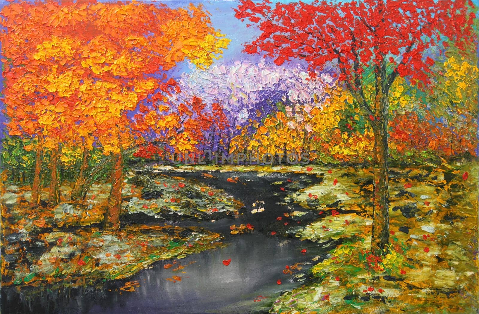 Winter river running through colorful autumn forest by jarenwicklund