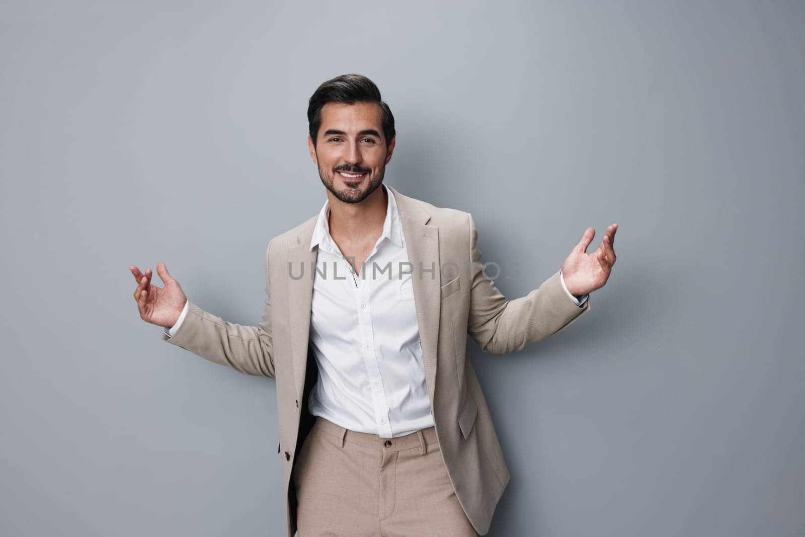 man crossed handsome happy model businessman smiling copyspace suit smile white business isolated job fashion portrait stylish formal folded beige professional
