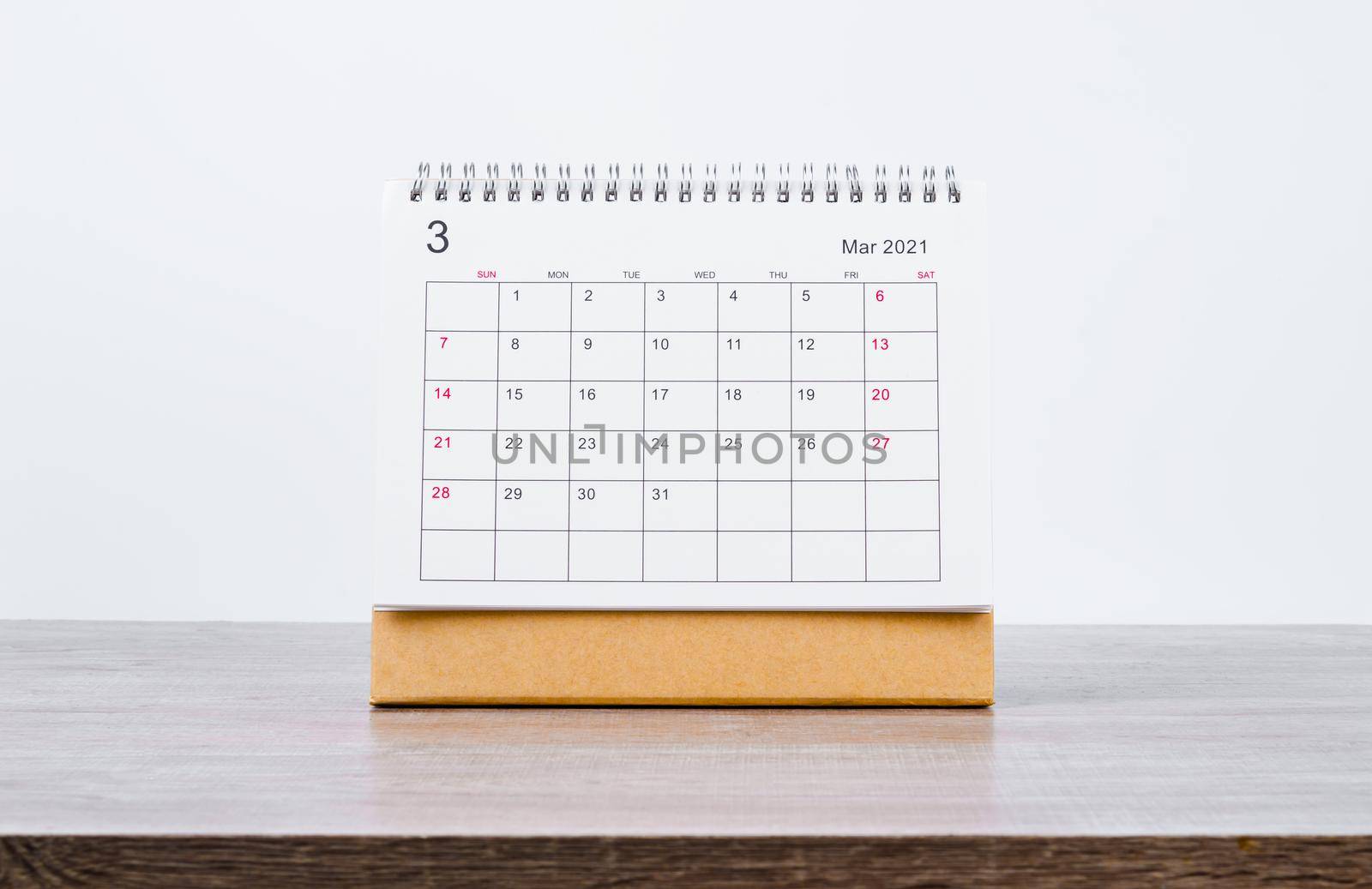 March Calendar 2021 on wooden table background