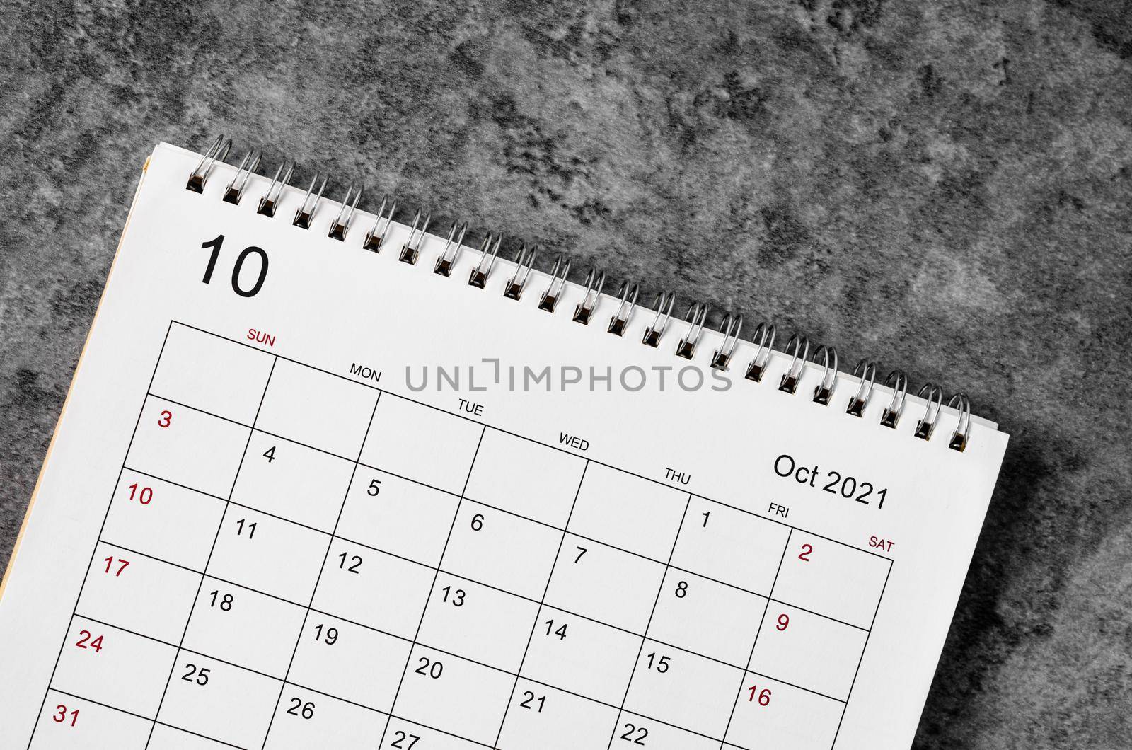 December Calendar 2021 on wooden table background.