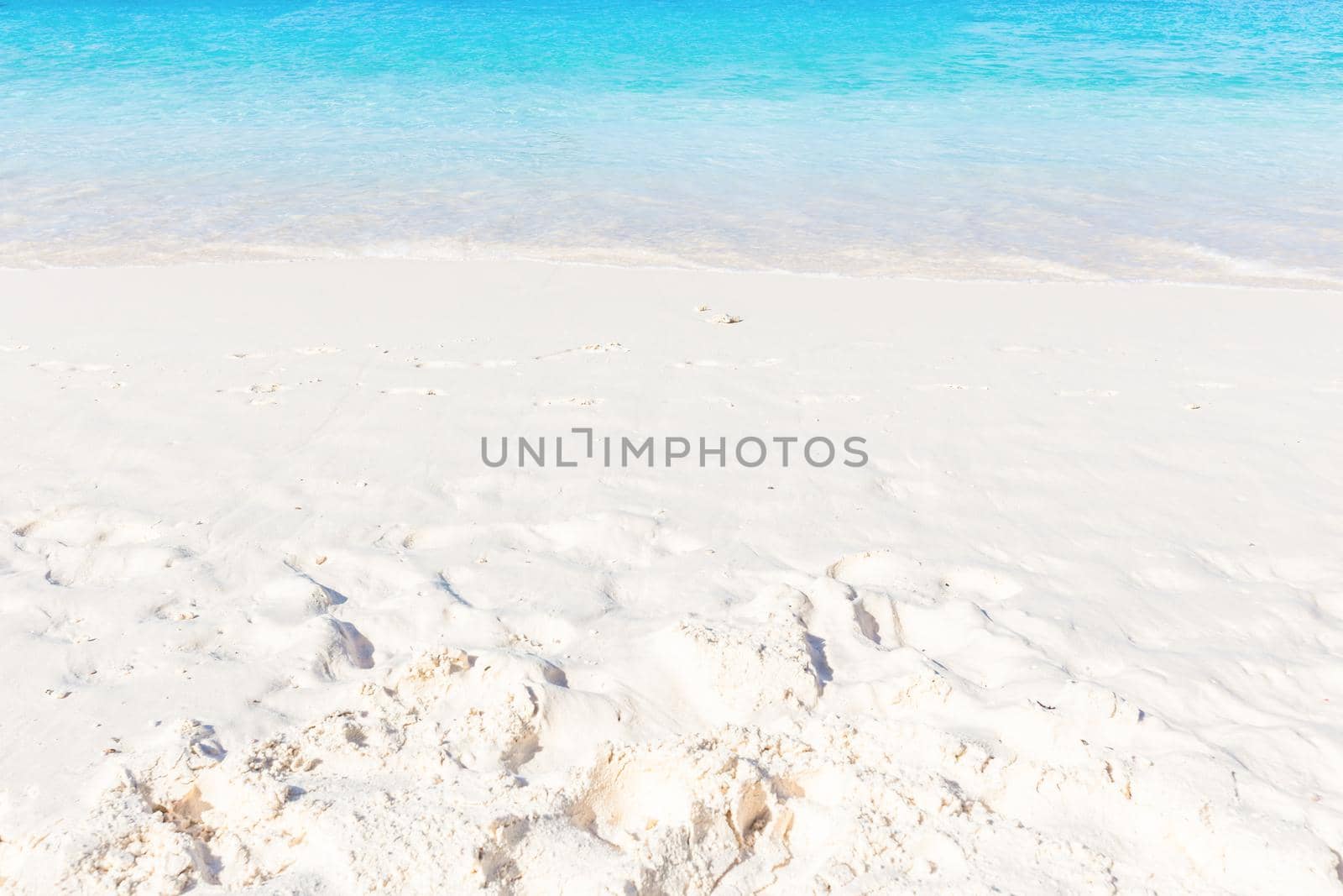 Wave of the sea on the sand beach at Similan islands, Thailand, Phuket.