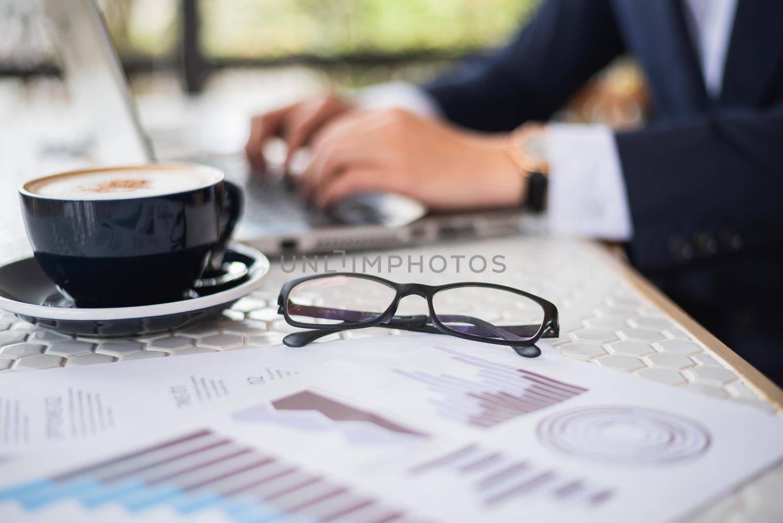 business man working with laptop on the table