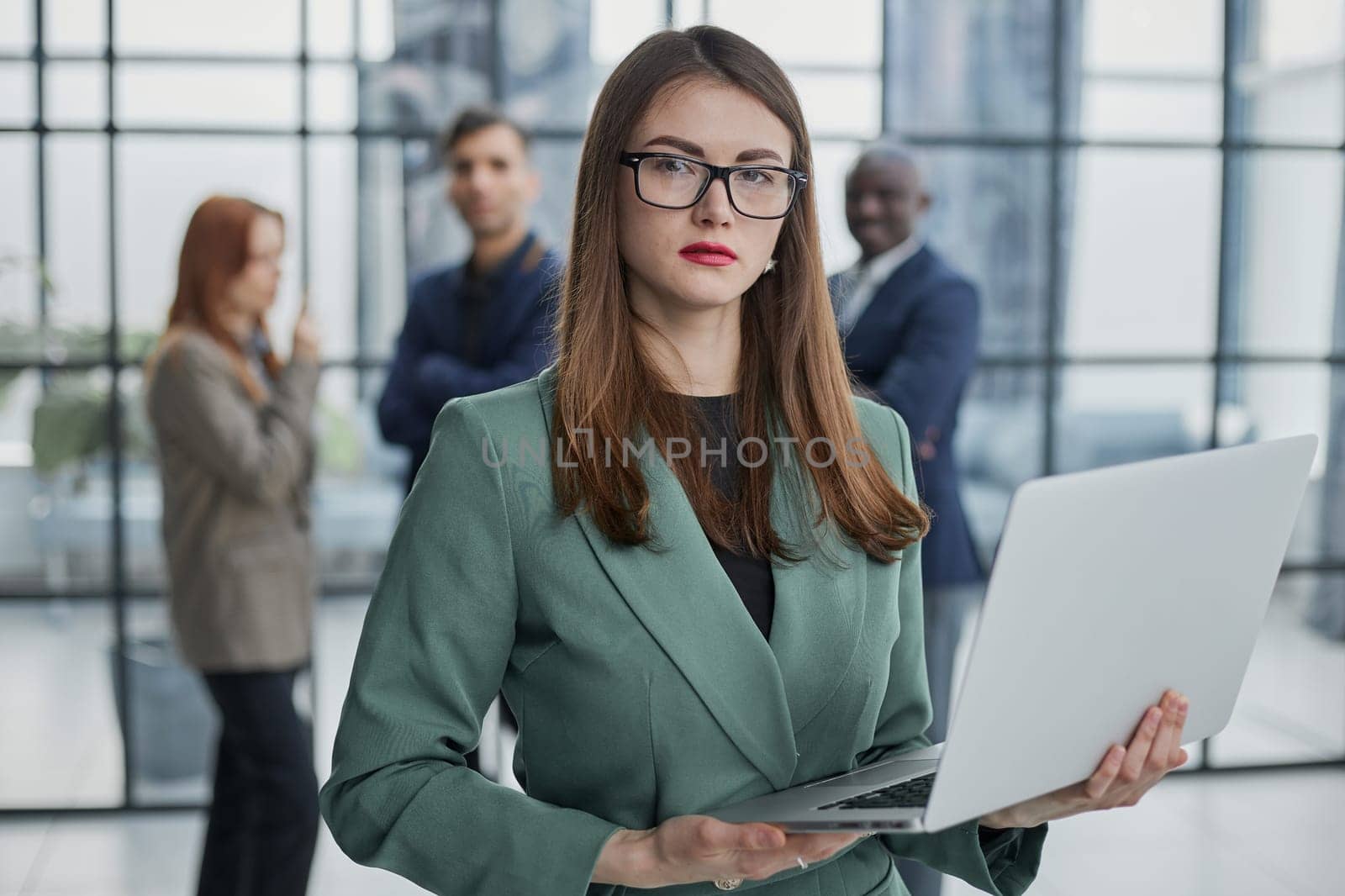 Portrait, Professional and confident millennial businesswoman or female executive manager in formal suit and eyeglasses by Prosto