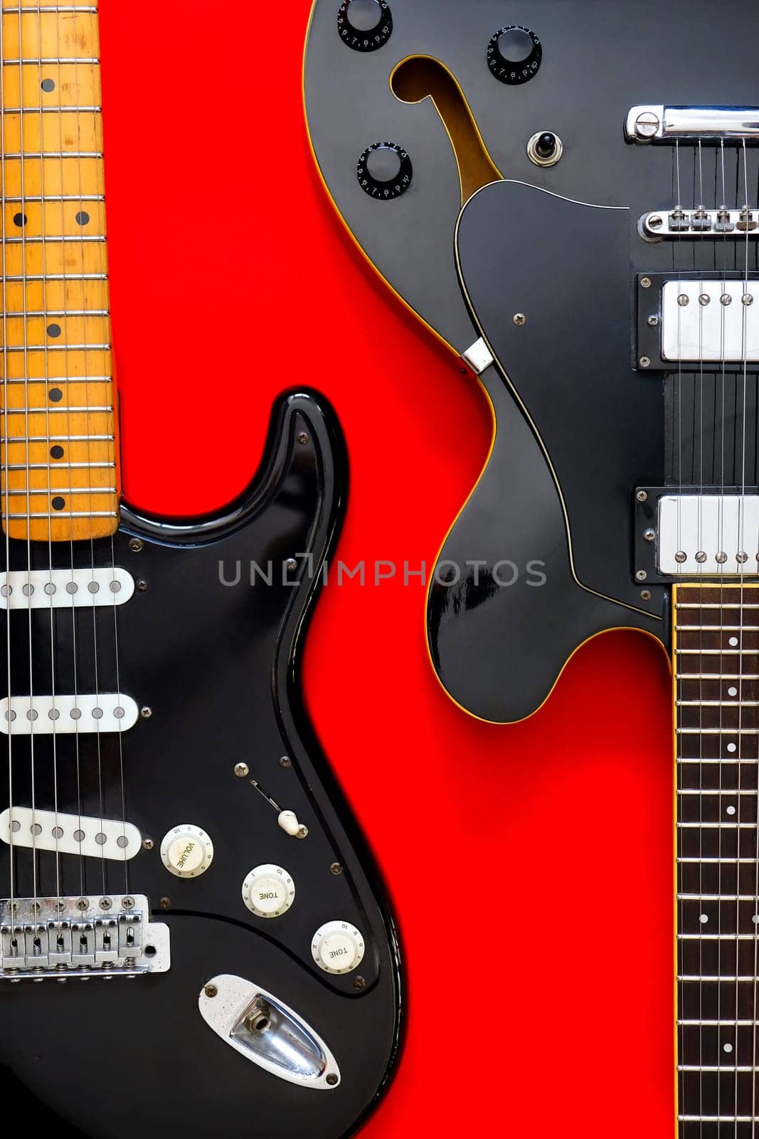 Electric Guitar on a red background.