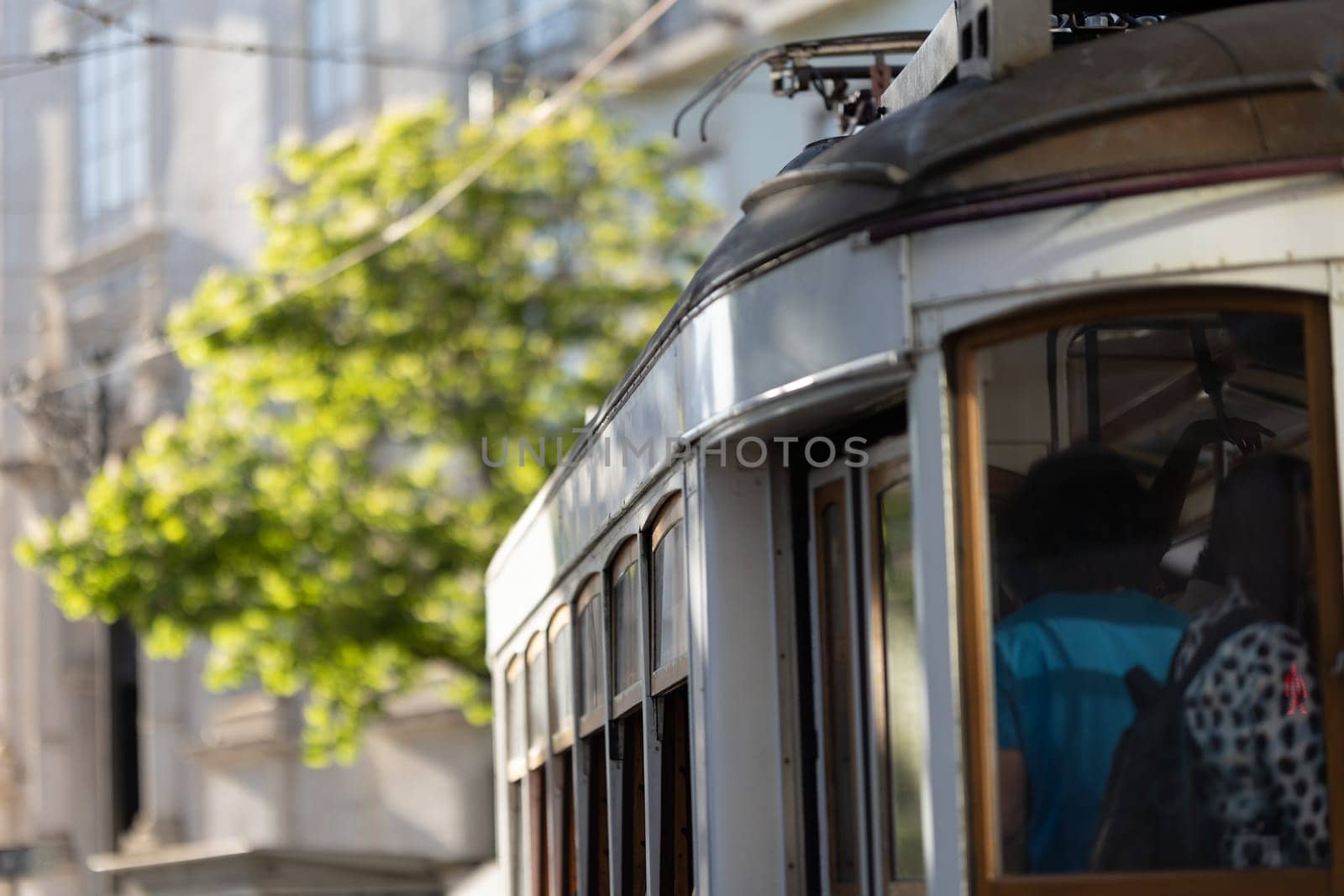 An old tram in the centre of Lisbon. Mid shot