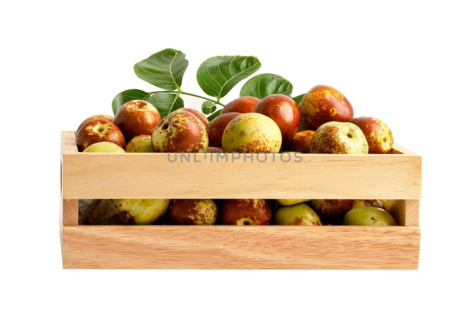 Jujube fruit in wooden box isolate on white background with clipping path.