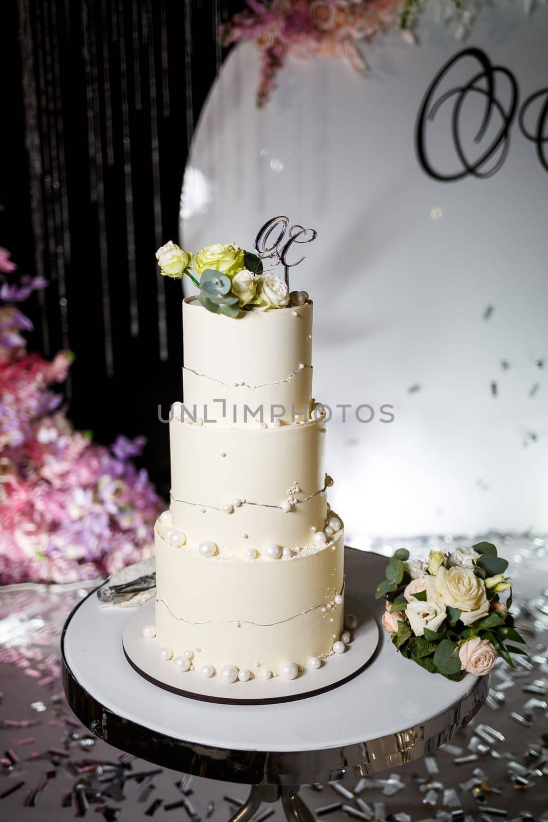 Delicious sweet layered fresh cake for the holiday with beautiful decorations by Dmitrytph