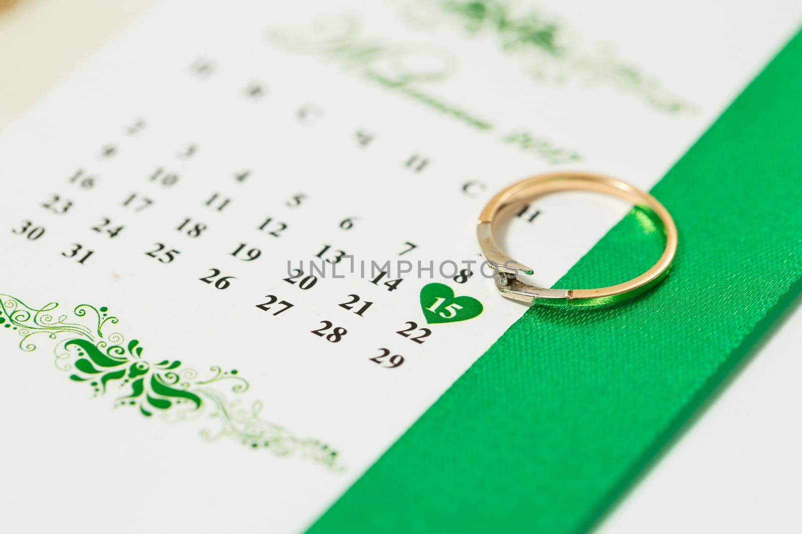 Golden wedding rings for newlyweds on their wedding day by Dmitrytph