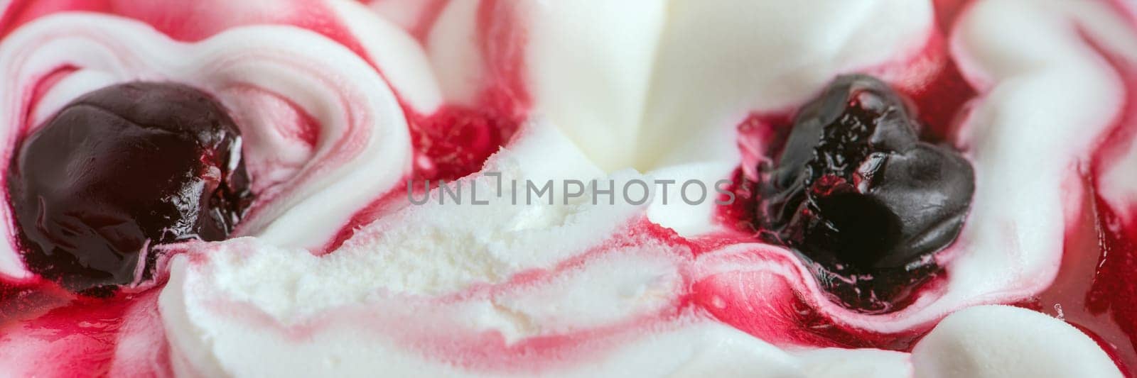 Texture of cherry ice cream. Fresh and delicious ice cream with cherries is a tasty treat for children and adults. High quality photo