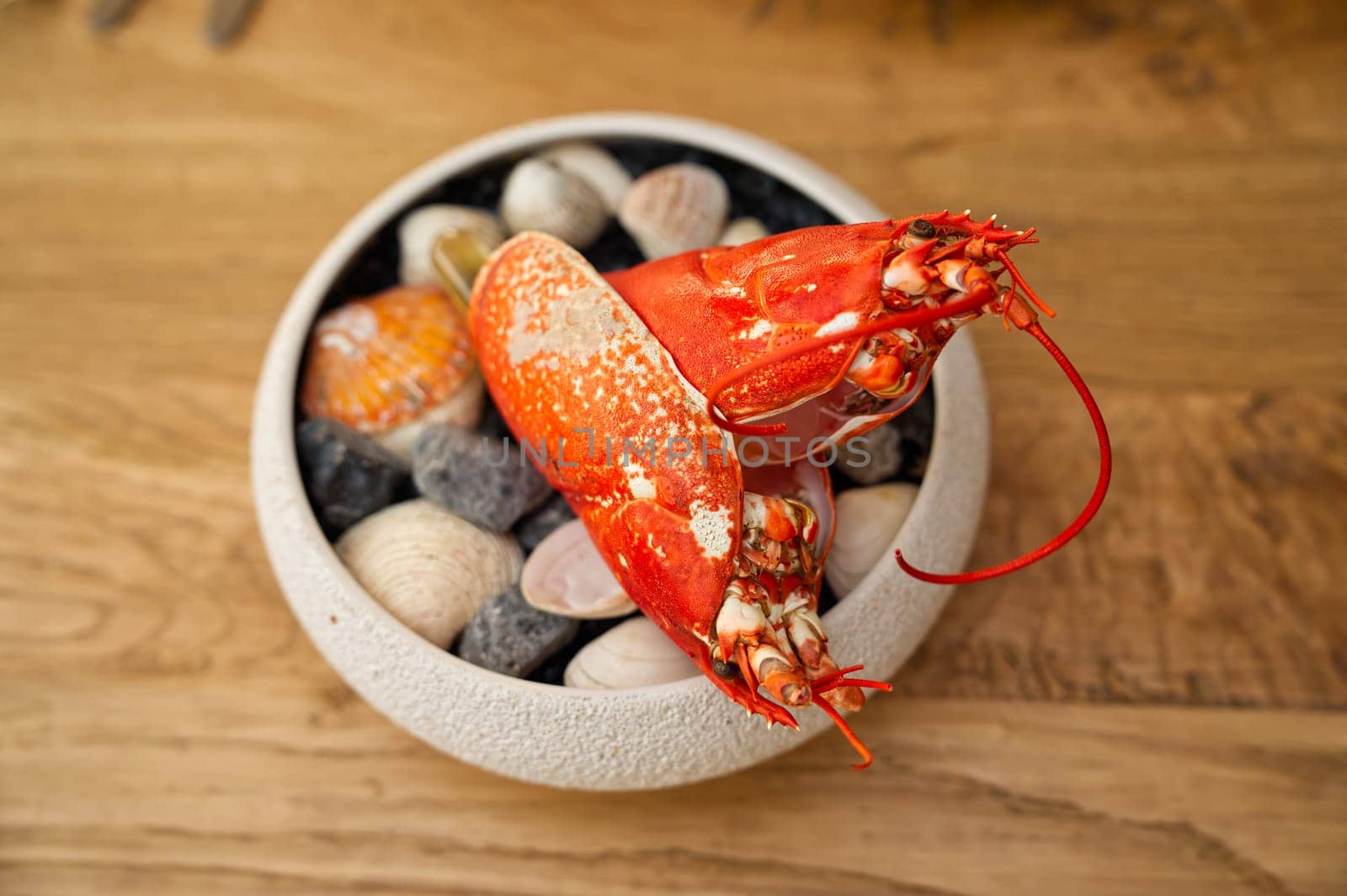 Cooked fresh lobster. Red lobster dinner seafood. Gourmet food healthy boiled lobster by PhotoTime