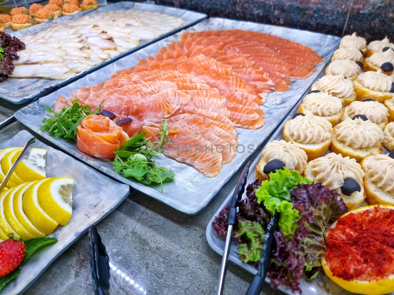 Smoked salmon fillet on the table. Buffet