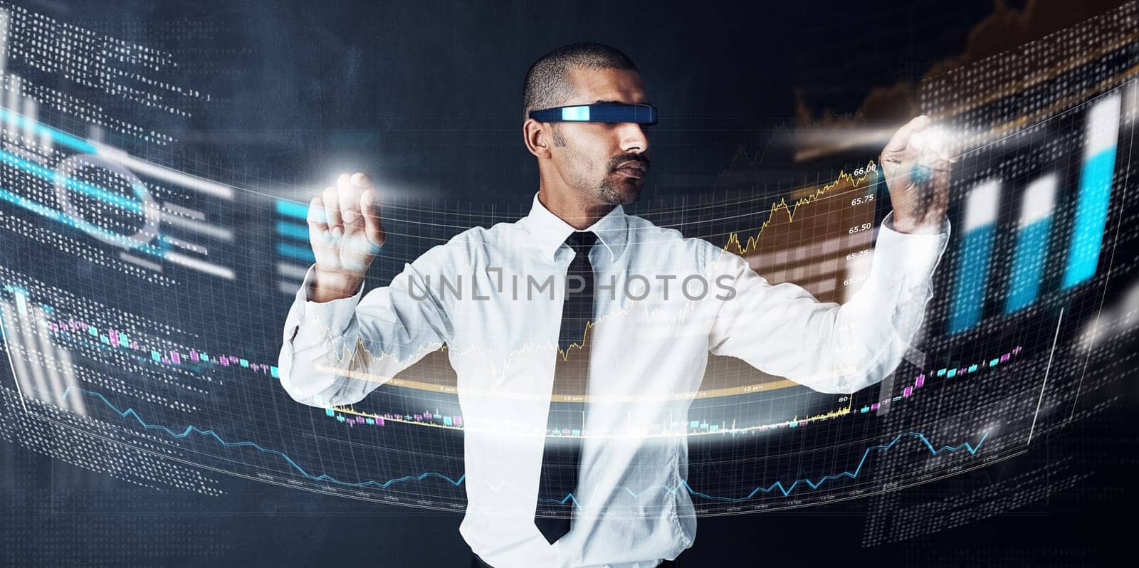 Touching the future. a handsome young businessman using a digital interface