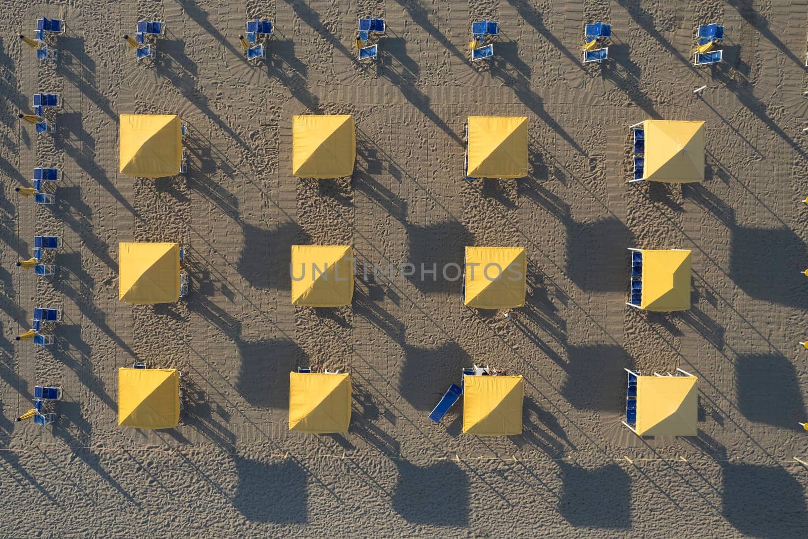 Aerial view of the Tuscan Versilia beach photographed from above in the evening 
