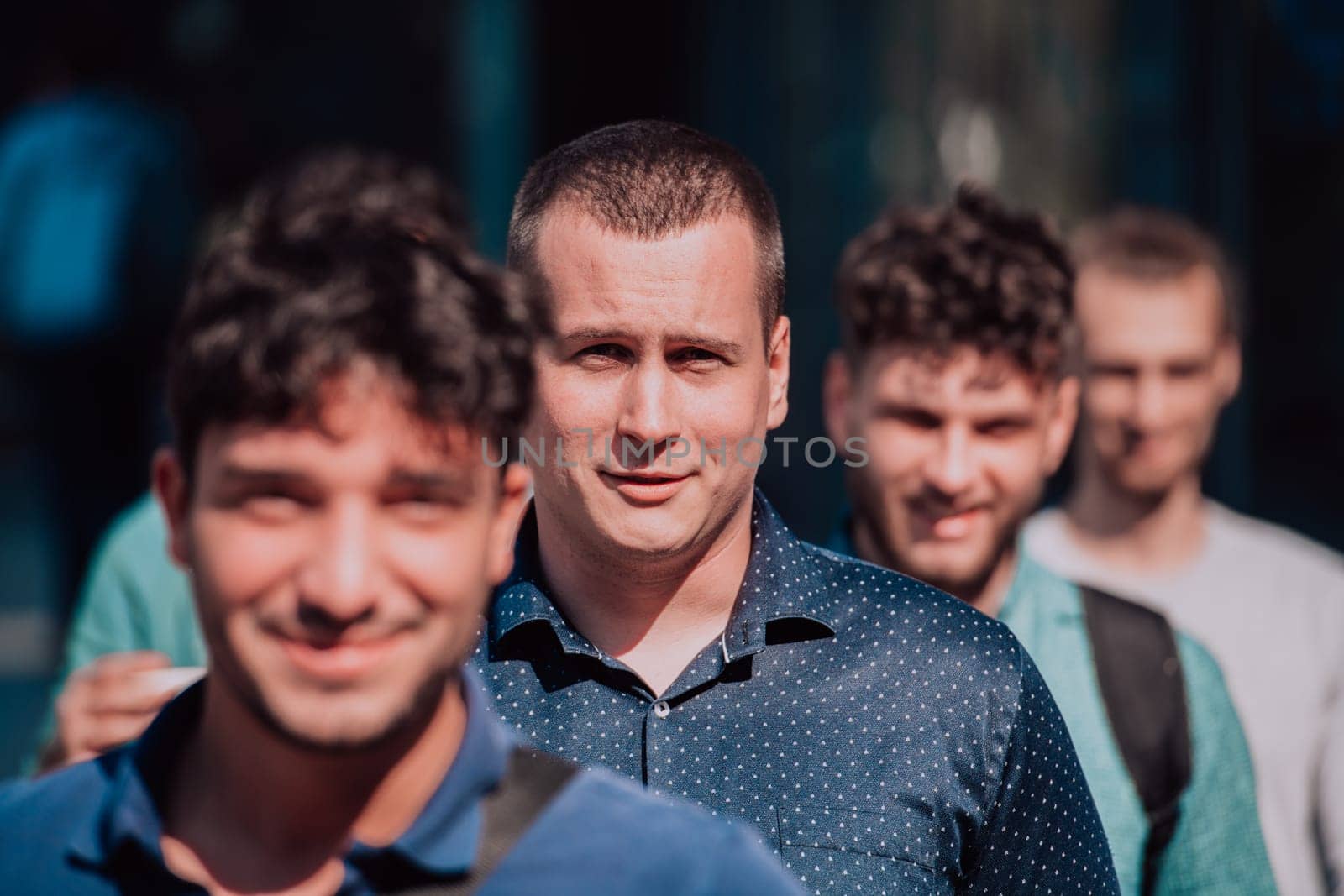 A diverse group of businessmen and colleagues walking together by their workplace, showcasing collaboration and teamwork in the company