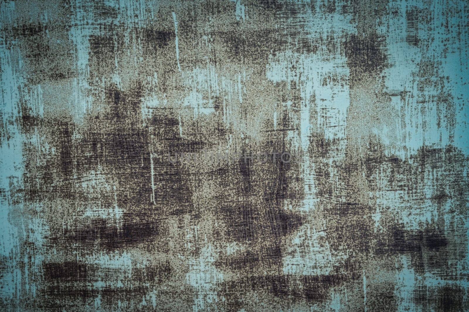 The background of an old iron sheet painted blue with rust spots. dirty blue background. grunge rusted metal texture, oxidized metal background. Old metal blue iron panel.