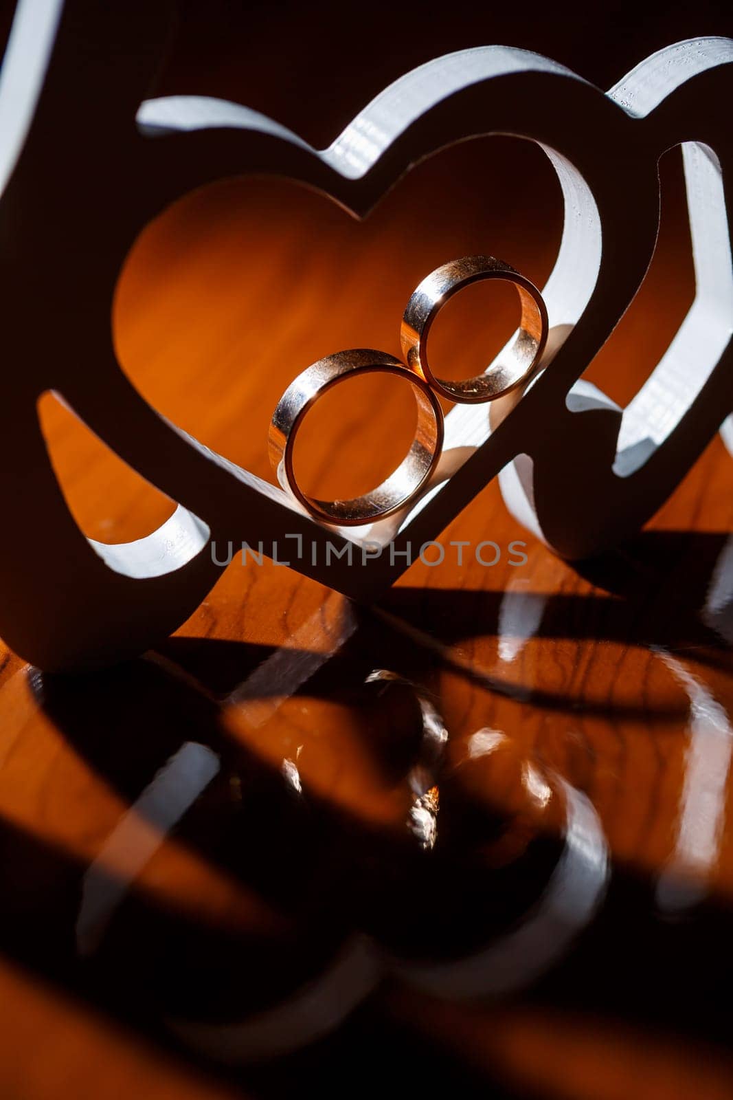 Golden wedding rings for newlyweds on their wedding day