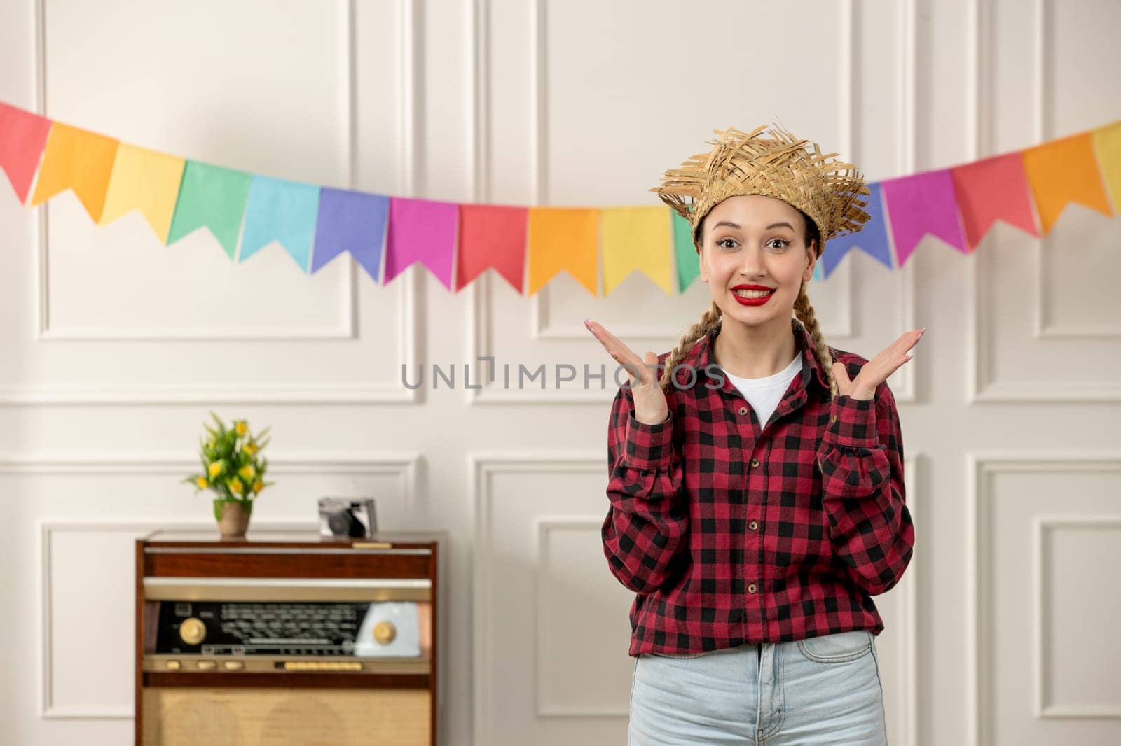 festa junina cute girl in straw hat brazilian midsummer with retro radio colorful flags excited by Kamran