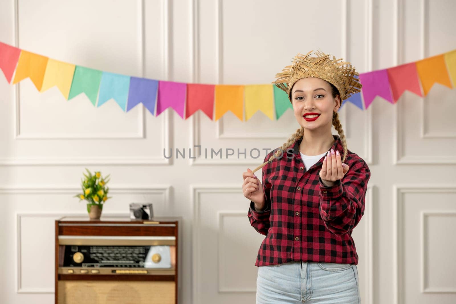 festa junina cute girl in straw hat brazilian midsummer with retro radio colorful flags smiling