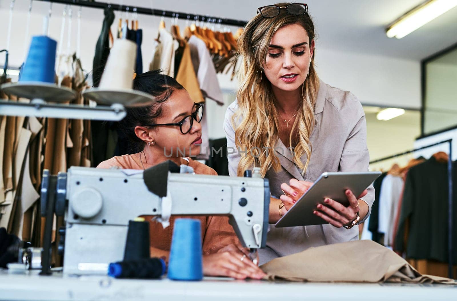 This is the technique I want you to follow. two fashion designers working together in a workshop