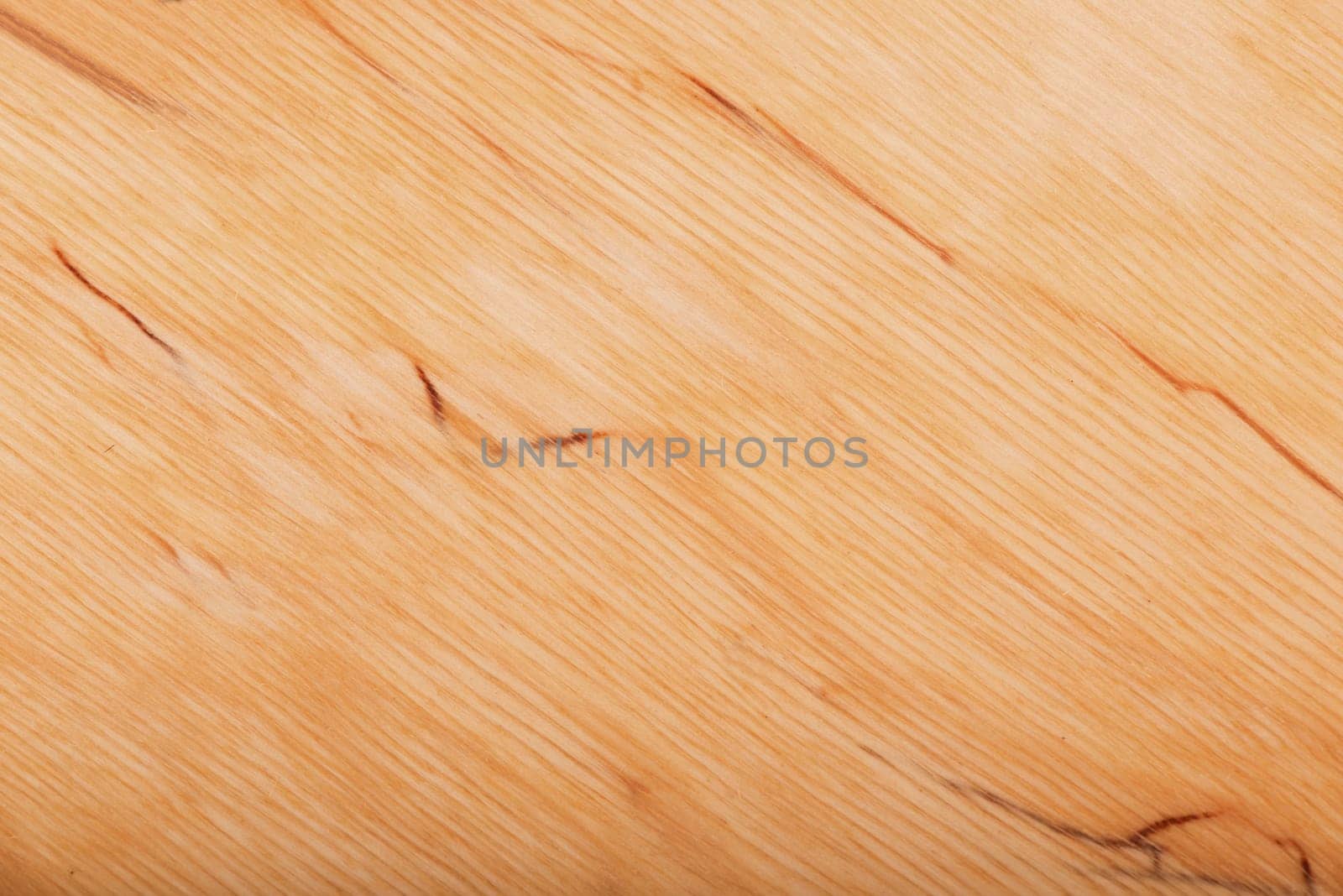 Brown wooden background close up. Surface of fresh wood, plywood.