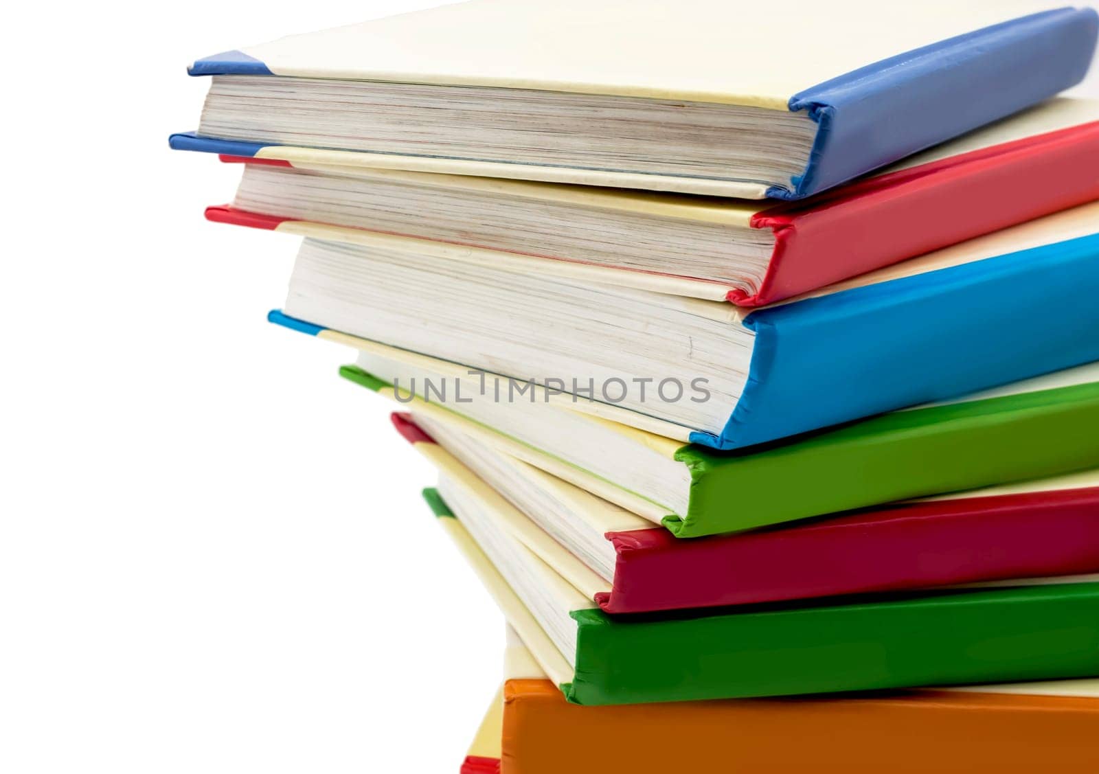 Multicolored books. The school. Stack of bright children's books on white background by aprilphoto