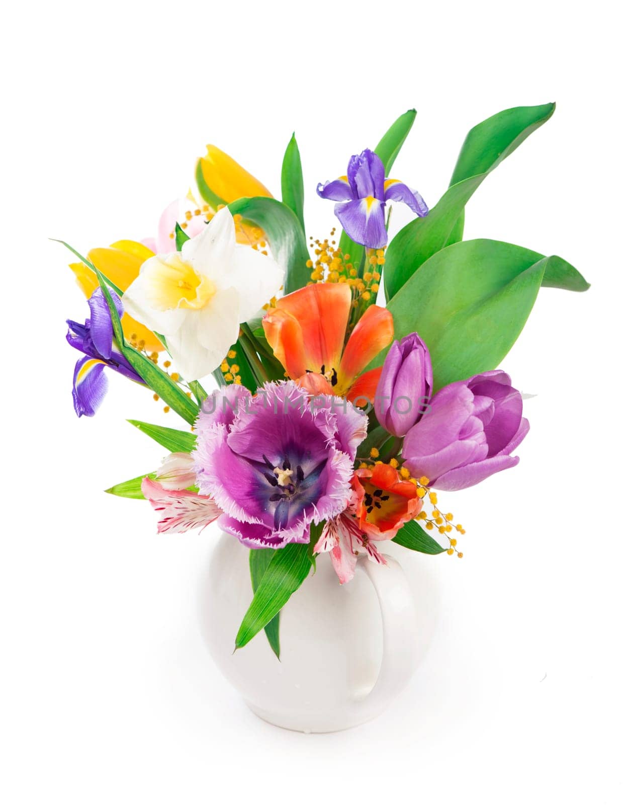 Bright spring bouquet in a white vase. spring flowers, daffodils, tulips, hyacinths, irises and mimosa isolated on a white background by aprilphoto