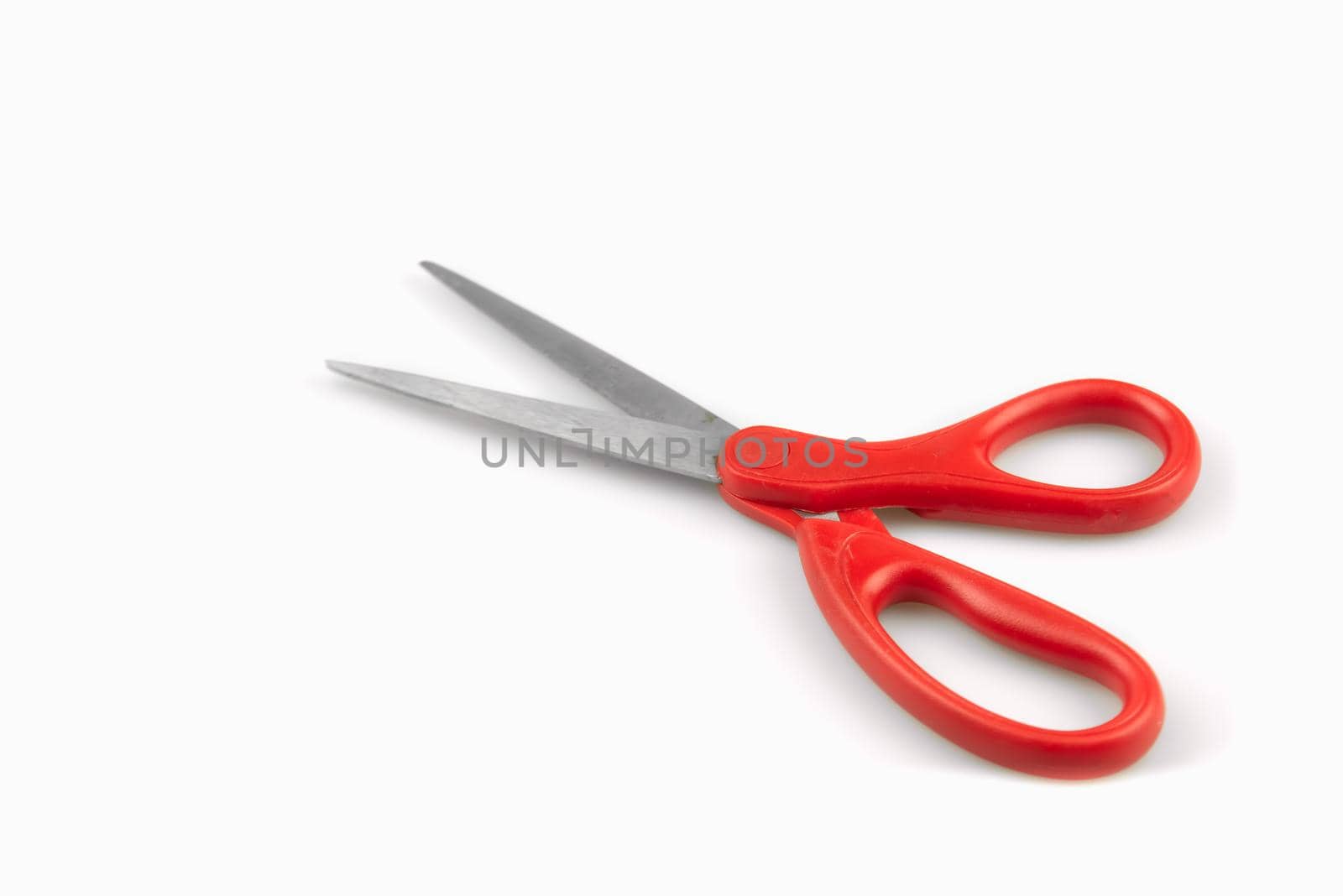 Close up of Scissors isolated on white background by Wmpix