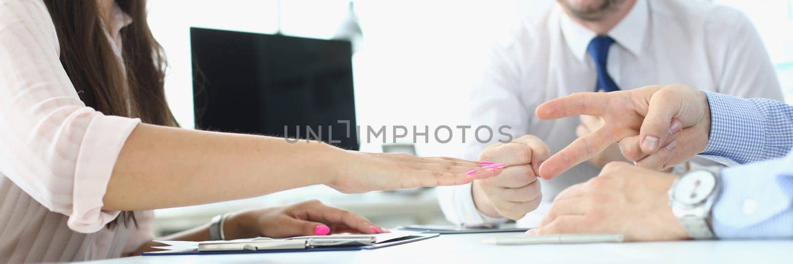 Funny business concept, businessman playing Rock Paper Scissors,. Plays at table during negotiations concept