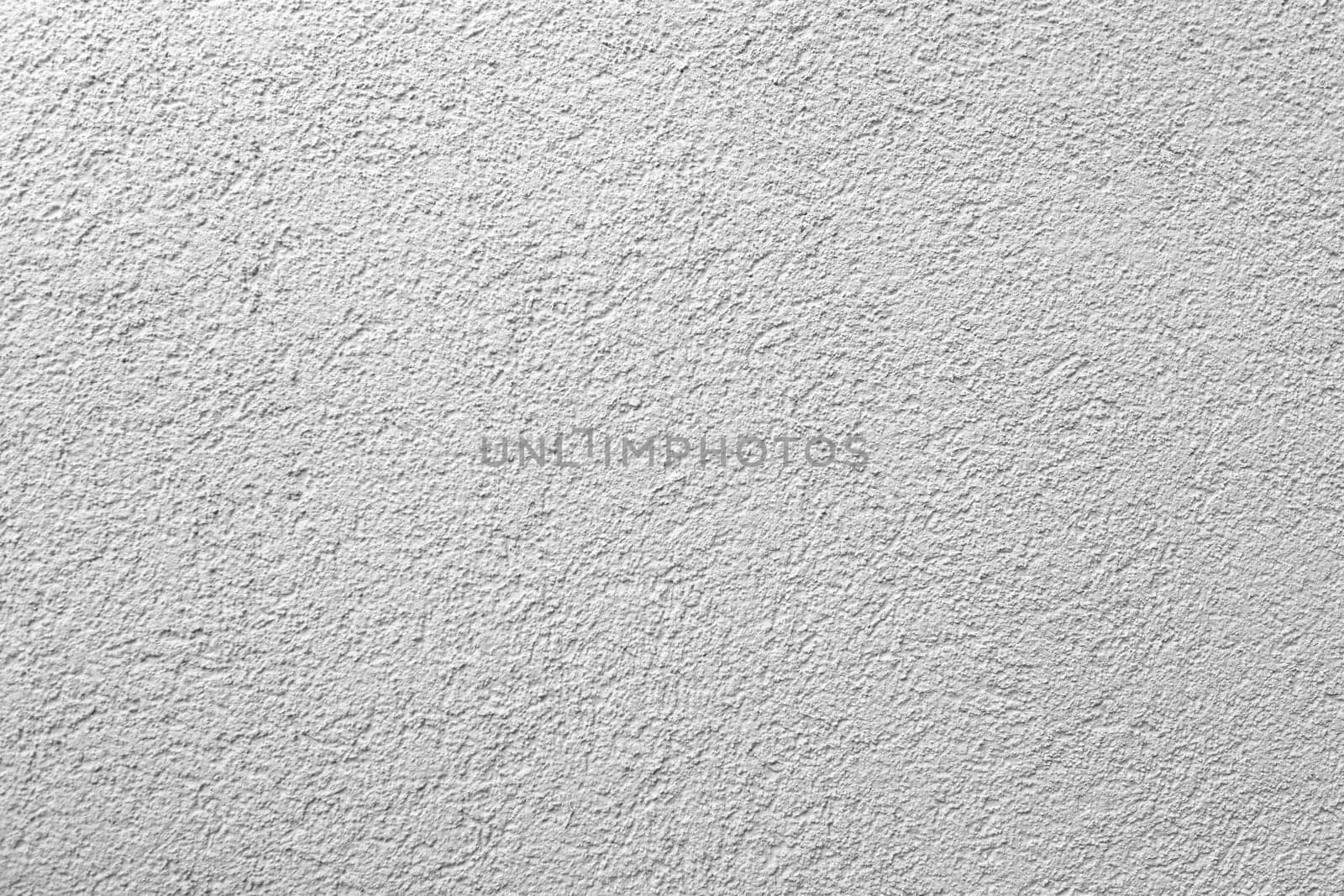 Textured gray abstract background. Monochrome image of gypsum plaster for overlay in design. High quality photo