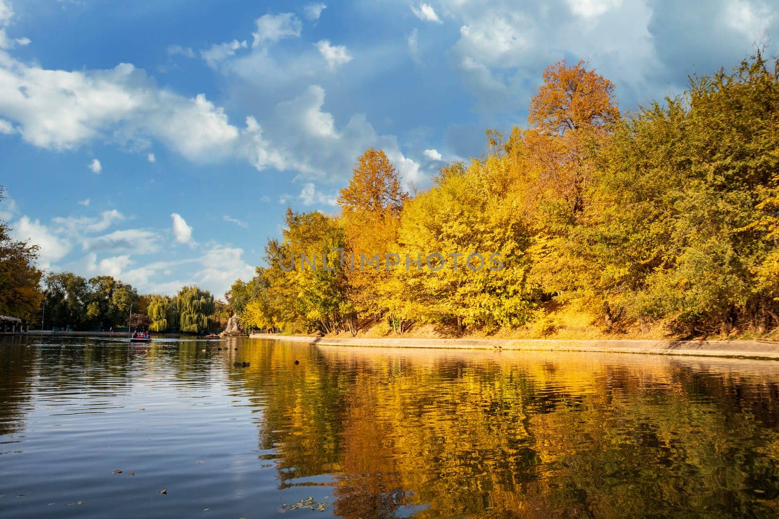 Picturesque Autumn lake in Central Park, Gorky Park, of Almaty, Kazakhstan by Rom4ek