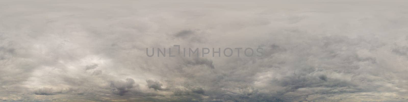 Sky panorama on overcast rainy day with low clouds in seamless spherical equirectangular format. Complete zenith for use in 3D graphics, game and for aerial drone 360 degree panorama as a sky dome.