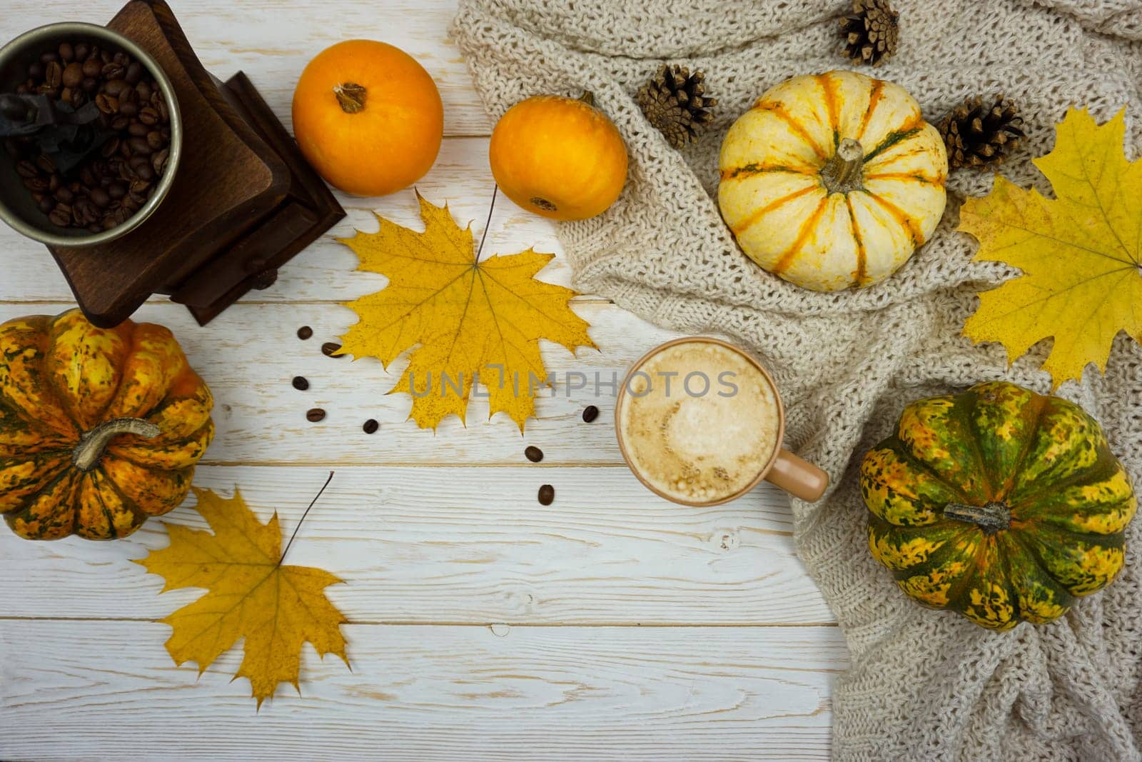 Autumn flatley with yellow leaves, pumpkins and a coffee grinder. by Spirina