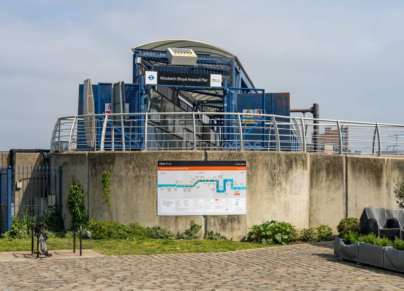 Woolwich, London - 14 May 2023: Entrance to Uber Boat pier for Thames Clipper in Royal Arsenal