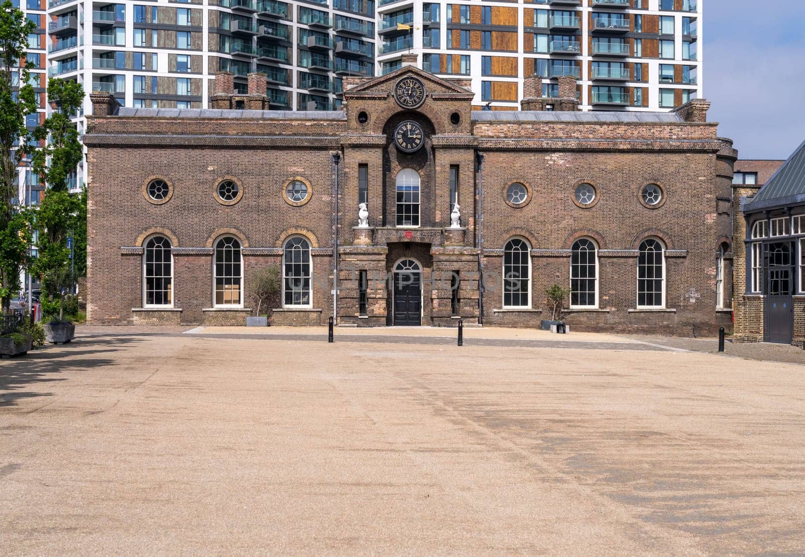 View of Royal Military Academy building in Royal Arsenal Riverside development with apartments behind