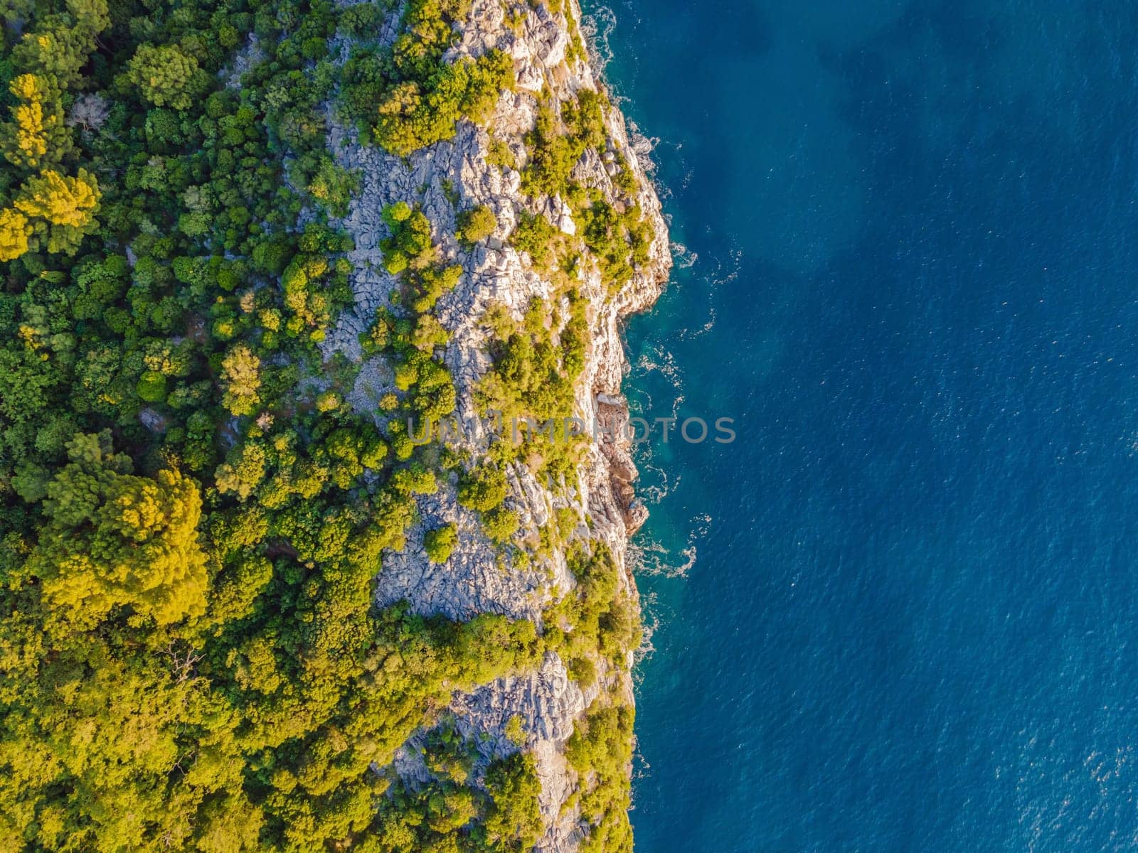 Aerial view of sea waves and Rocky coast in Montenegro.