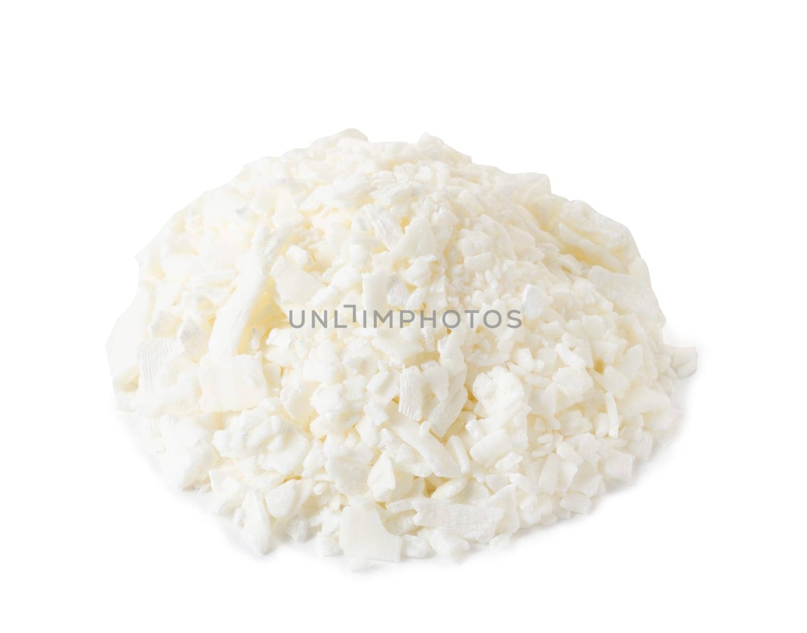 Pile of organic white soy wax flakes for candles isolated on white background with shadow