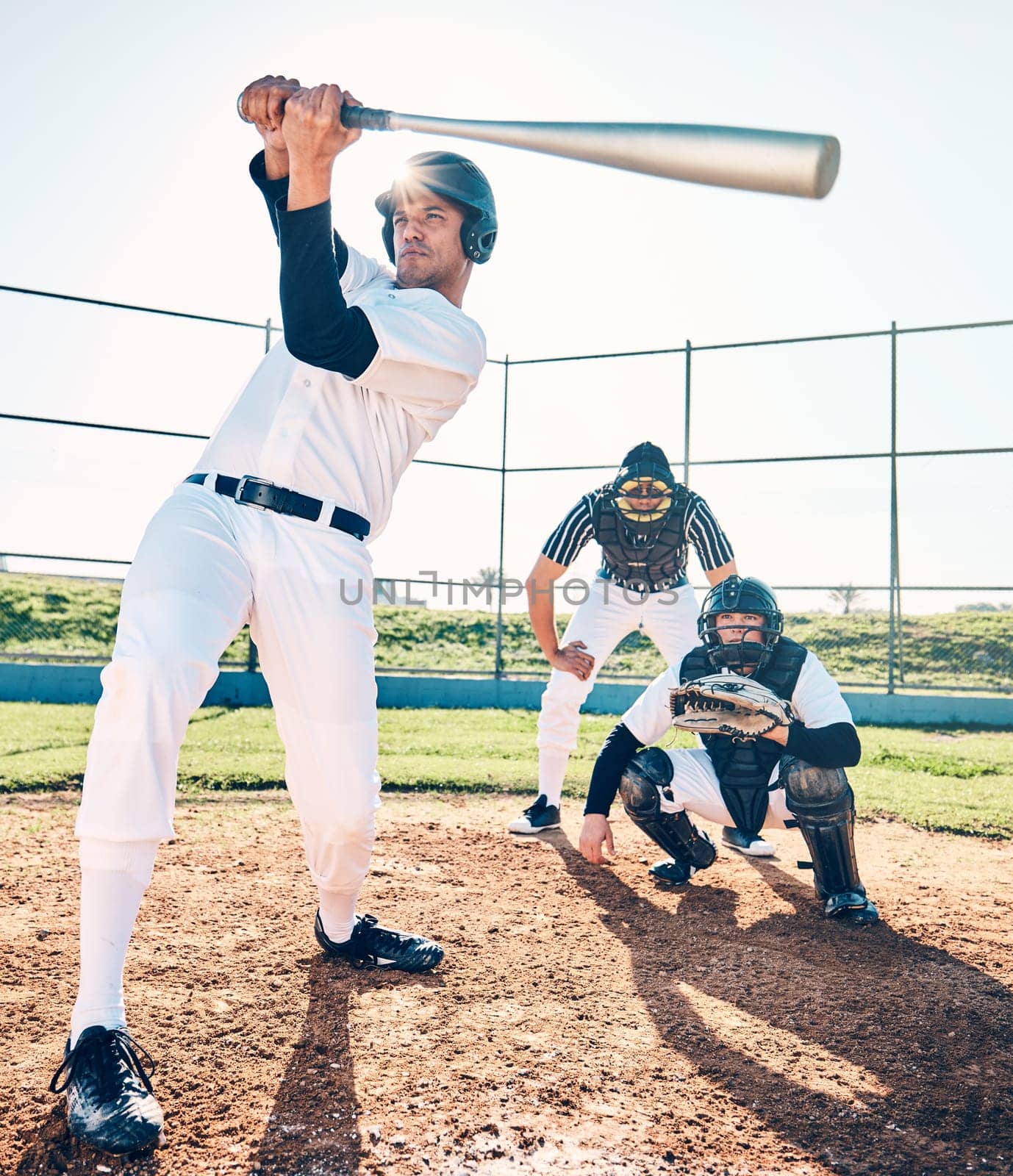 Sports, baseball and team with in action on field ready for playing game, practice and competition. Fitness, motivation and male athletes outdoors for exercise, training and workout for sport match by YuriArcurs