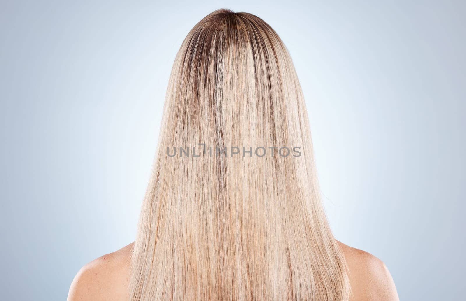 Hair care, woman and back for natural beauty, keratin and luxury against grey studio background. Mockup, female and lady with smooth hair, texture and wellness for hairstyle treatment and shine