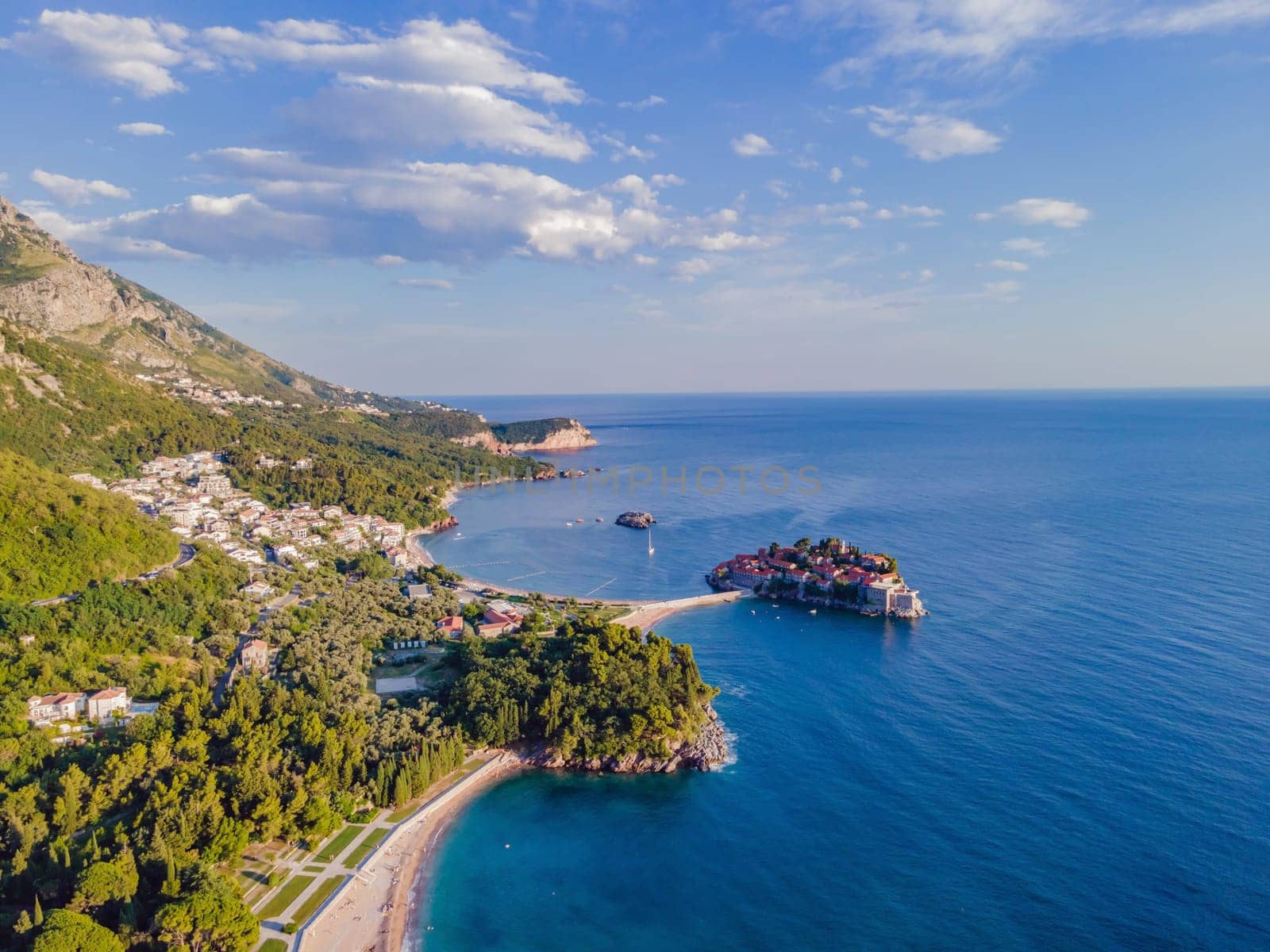 Queen's Beach in Milocer, Montenegro. Aerial view of sea waves and fantastic Rocky coast, Montenegro. drone by galitskaya