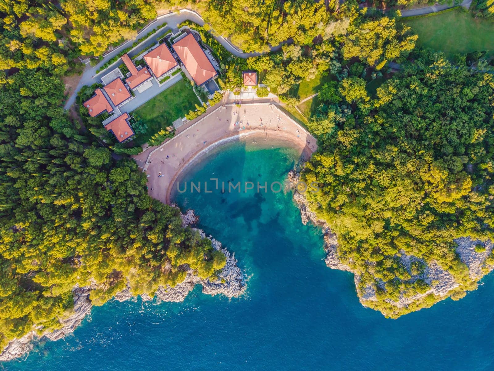 Queen's Beach in Milocer, Montenegro. Aerial view of sea waves and fantastic Rocky coast, Montenegro. drone by galitskaya