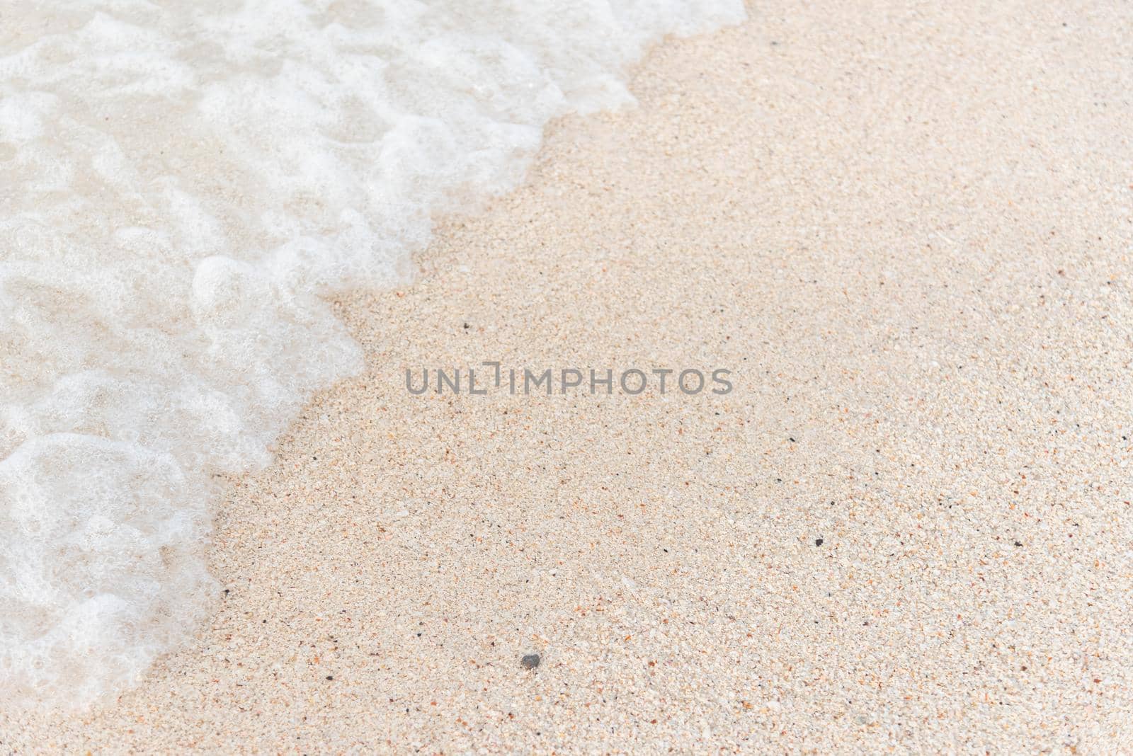 sea and white sand beach by Wmpix