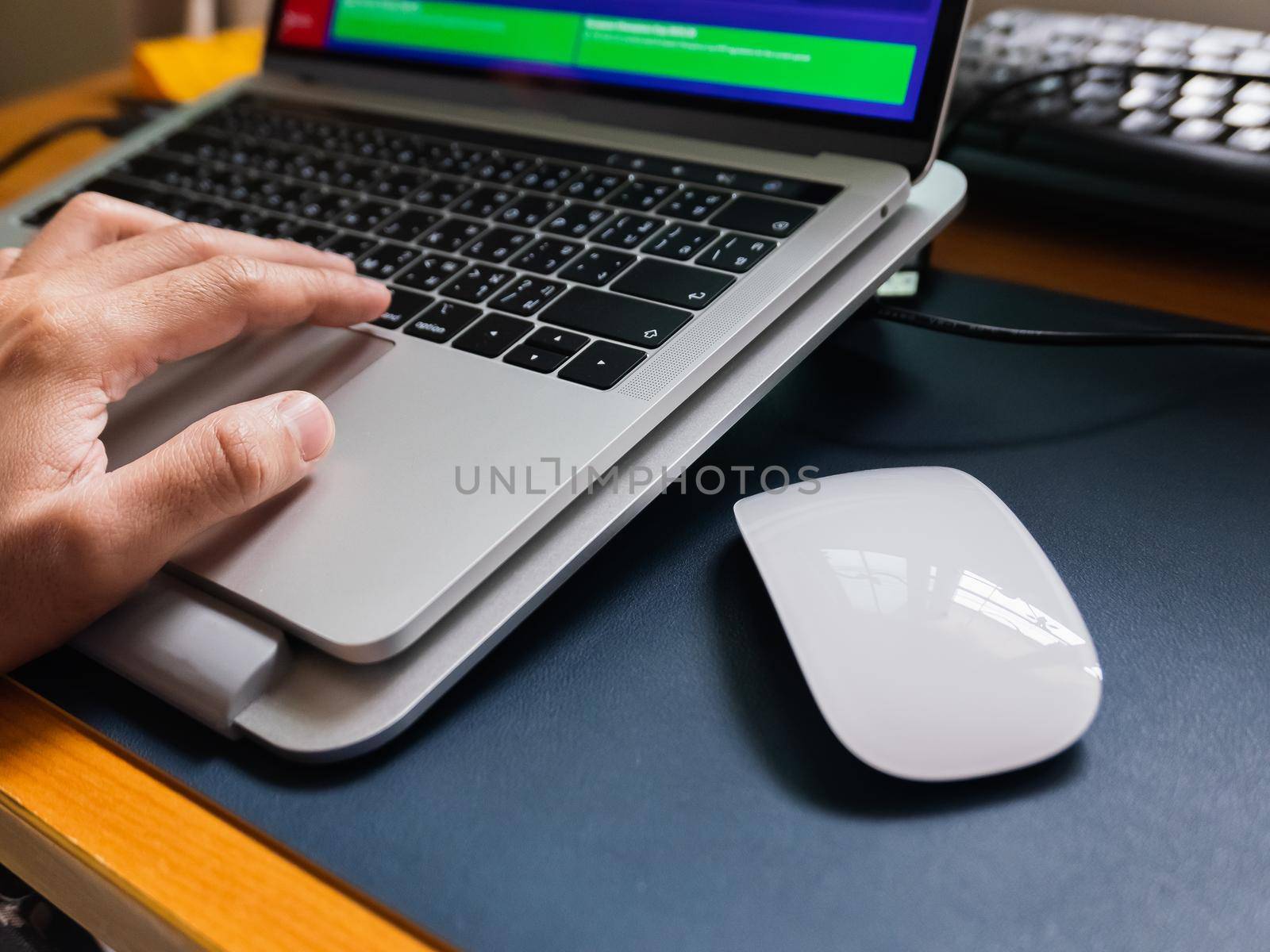 close up of mouse and laptop on the table by Wmpix