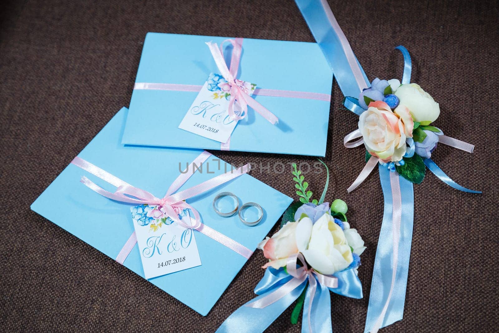 Golden wedding rings for newlyweds on their wedding day by Dmitrytph