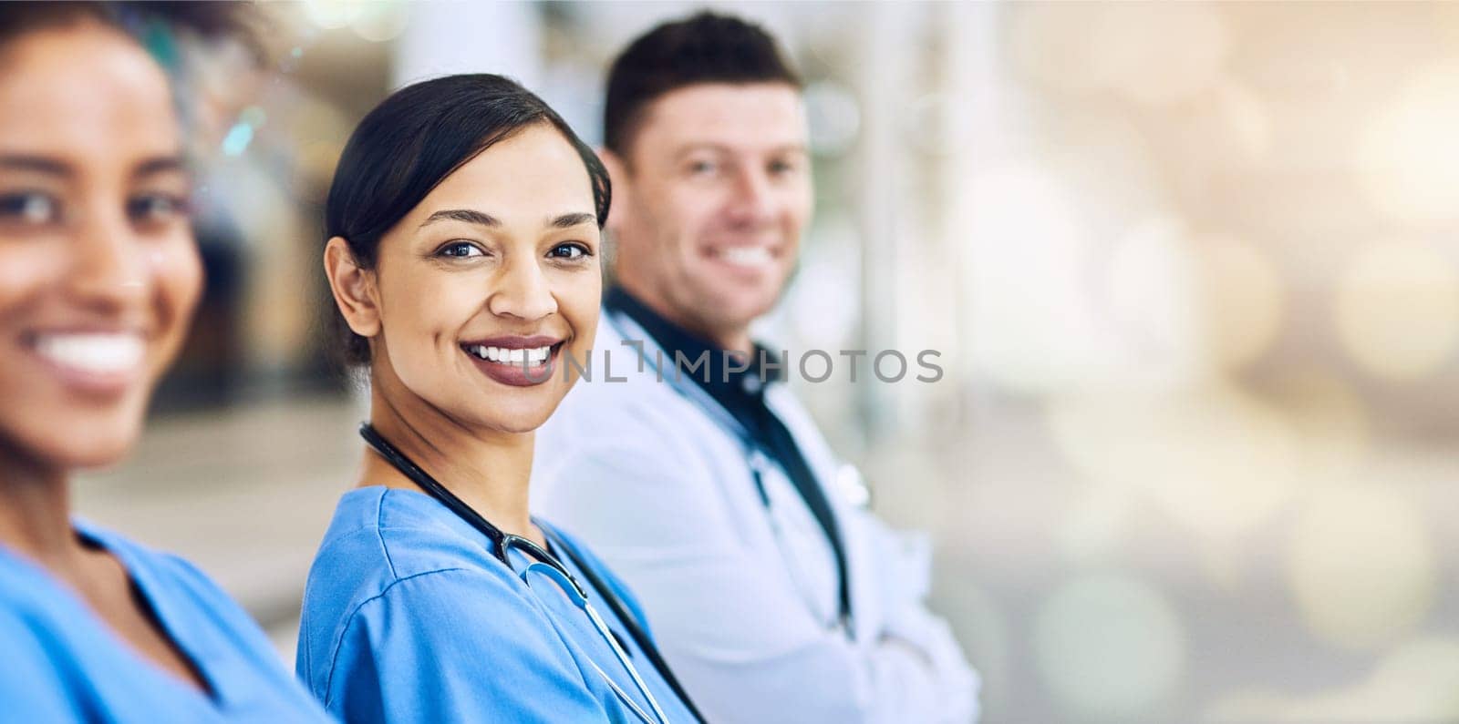 Doctor, team and portrait smile on mockup for healthcare, help advise or consultation at hospital. Happy medical professionals smiling in teamwork, collaboration or life insurance on bokeh background by YuriArcurs